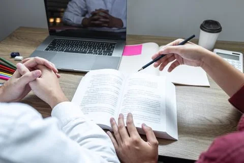 Teaching helping and study course, Team of young teacher or tutor helps stude Stock Photos