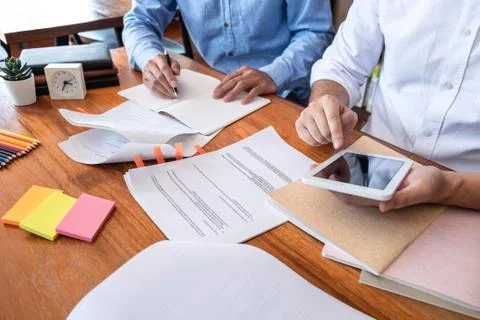 Teaching helping and study course, Team of young teacher or tutor helps stude Stock Photos