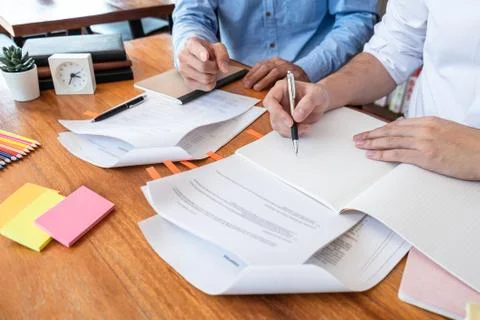 Teaching helping and study course, Team of young teacher or tutor helps stude Stock Photos