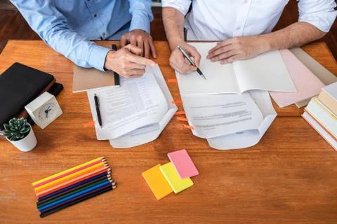 Teaching helping and study course, Team of young teacher or tutor helps stude 写真素材