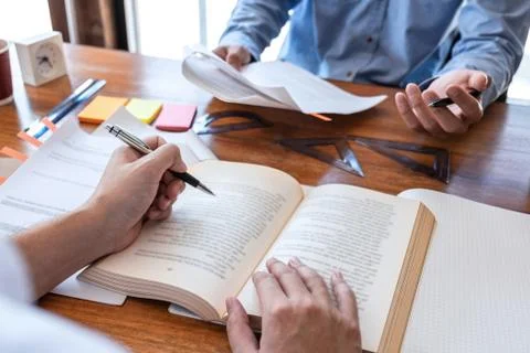 Teaching helping and study course, Team of young teacher or tutor helps stude Stock Photos