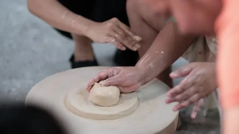 Teaching kid how to do ceramic Stock Footage 250332917