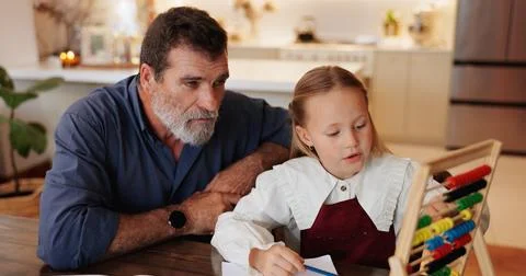 Teaching, math and homework with grandfather and child for education, support Stock Photos