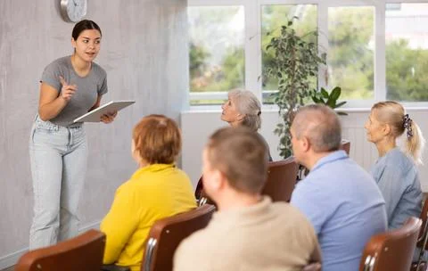 Teaching older people in advanced training courses at university Stock Photos