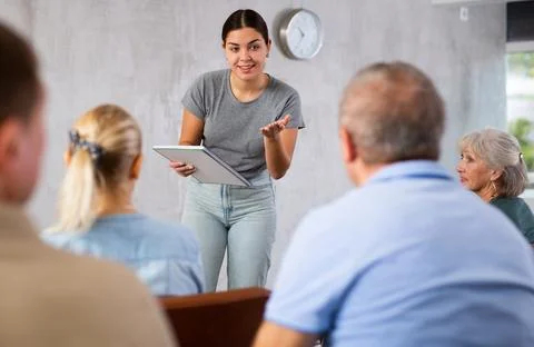 Teaching older people in advanced training courses at university Stock Photos