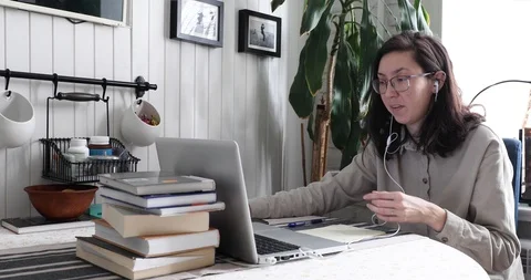 Teaching student on webinar in app via internet connection Stock-Footage 126997393