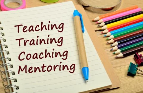 Teaching Training Coaching Mentoring words Stock Photos