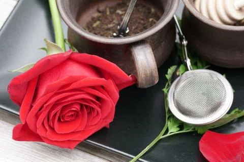 A teacup with a Rose. Stock Photos