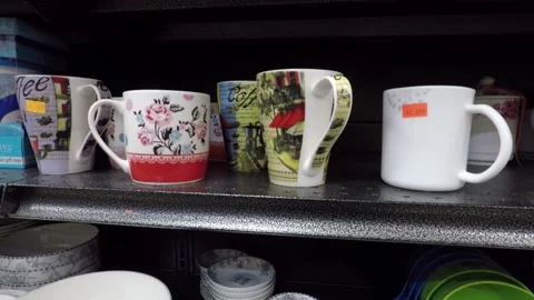 Teacups , cups  Chinaware on store shelf Stock Footage 131276840
