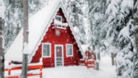Teady shot snow falling on dark mountain forest woods and cabin house hut travel Stock Footage 144254375