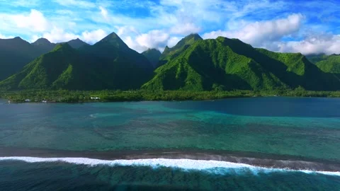 Teahupo'o surf wave waves crashing on coral reef aerial drone harbor view Stock Footage 340964484