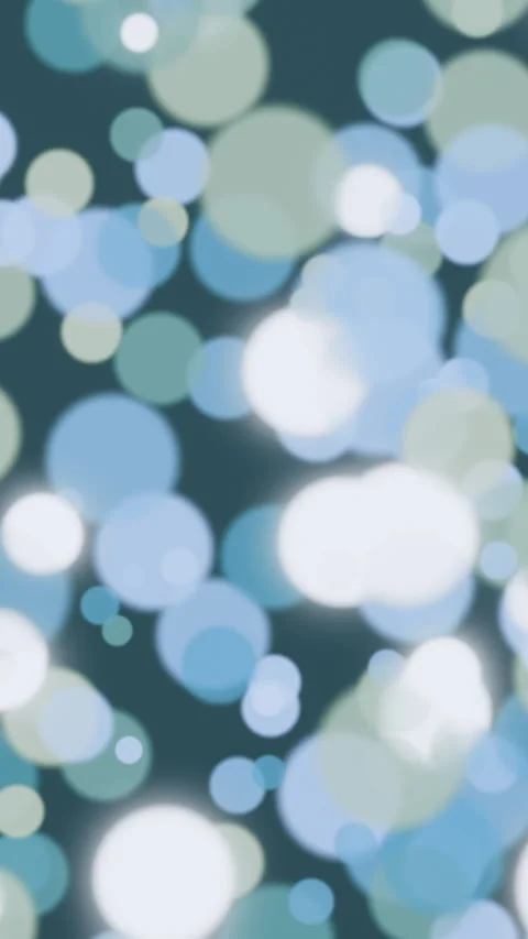 Teal and Blue Bokeh Lights Soft Blurred Circles Vertical Seamless Loop Video stock 345853099