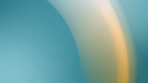 Teal and orange gradient arc creating a smooth seamless loop background. 4K. 库存影片 309701035