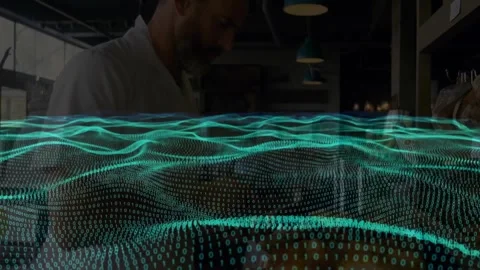Teal binary waves flowing over bakery counter activating baker inspecting dough Stock Footage 328007372