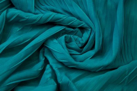 Teal blue fabric overlapping pattern on the center Stock Photos