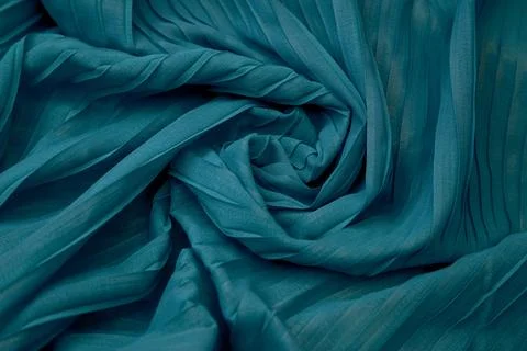 Teal blue fabric overlapping pattern on the center Stock Photos