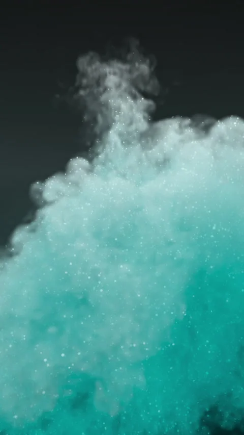 Teal blue particulate sphere exploding in slow motion Stockbeeldmateriaal 347254965