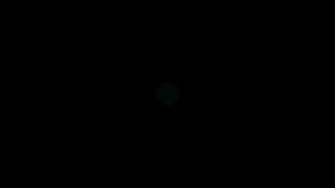 Teal circle pulsating on black background a solitary appears to pulse or glow Vidéo 334735438