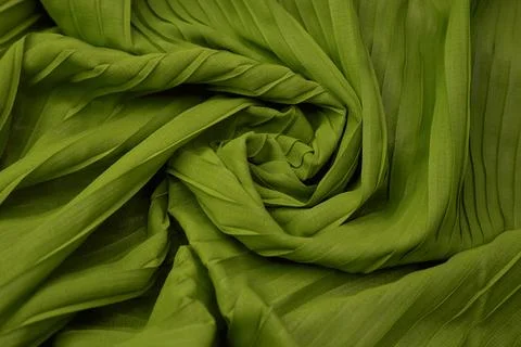 Teal green fabric overlapping pattern on the center Stock Photos