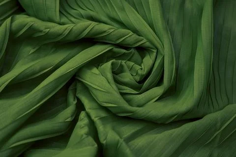 Teal green fabric overlapping pattern on the center Foto stock