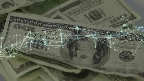 Teal network appearing and moving across stack of USD100 bills showing data flow Stock Footage 329454208