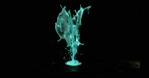 Teal paint in motion in 4K Stock Footage 59921296