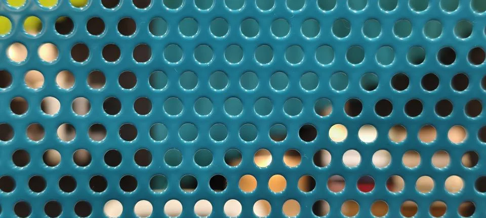 Teal perforated sheet 스톡 사진