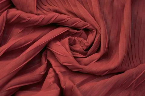 Teal red fabric overlapping pattern on the center Foto stock