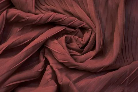 Teal red fabric overlapping pattern on the center Foto stock