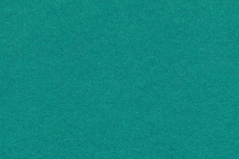 Teal textured paper background with subtle grain surface and soft structure.  스톡 사진