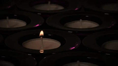 Tealight candle being lit Stock Footage 73956086