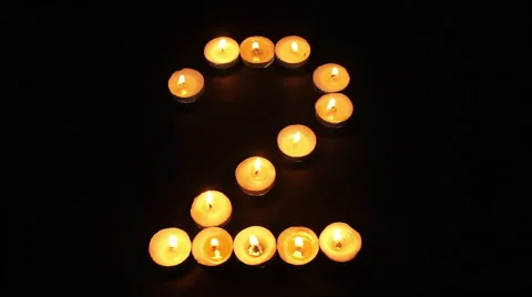 Tealight Candle Number Two Stock Footage 66782614