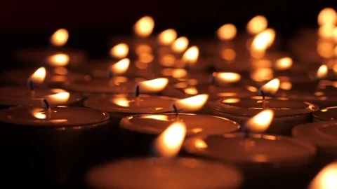 Tealight candles burning macro 4K Stock Footage 83466867
