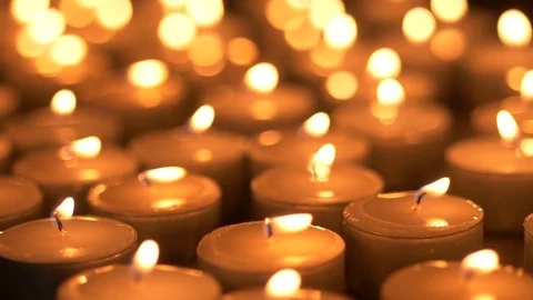 Tealight candles burning macro slow motion Stock Footage 83482156