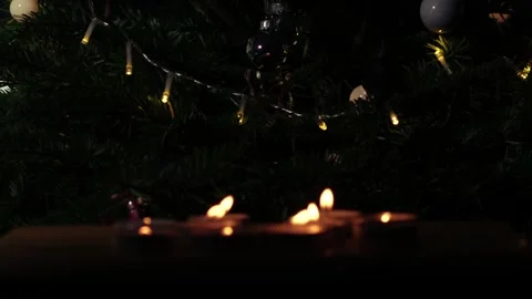 Tealight candles flickering with bokeh background Video stock 263837342