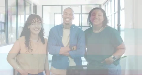 Team of 3 standing in office, frames starting bands over team, right using Video stock 330855108