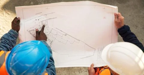 Team, above or architect at construction site with blueprint, development review Stock Photos