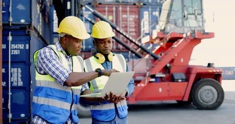 Team of African-American container workers use their laptops to inspect shipping 스톡 동영상 200859476