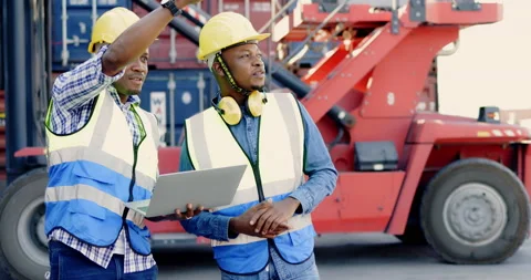 Team of African-American container workers use their laptops to inspect shipping Vídeo Stock 200859662