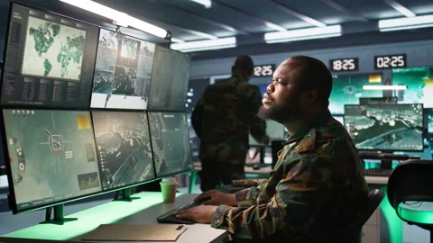 Team of agents in base of operations doing assessment of adversaries Vidéo 282061556