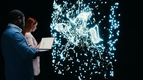 Team of AI startup data scientists implement deep learning algorithms with Stockfoto's