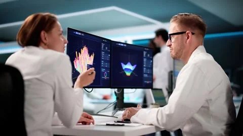 Team Of Analysts Using 3D Software For Research Stock Footage 311178402