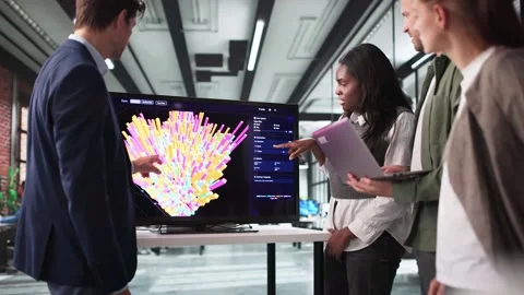 Team Of Analysts Using 3D Software For Research Stock Footage 311731377