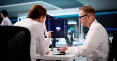 Team Of Analysts Using 3D Software For Research In Lab Stock Photos