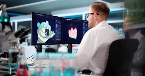 Team Of Analysts Using 3D Software For Research In Lab Stock Photos