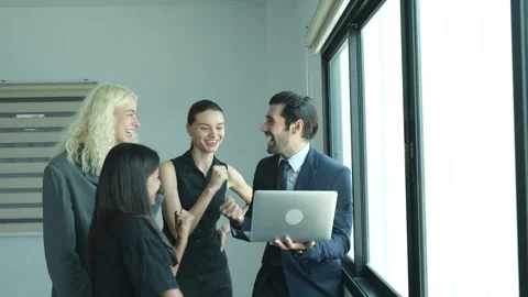 The team and the young executives are delighted and happy Stock Footage 255275088
