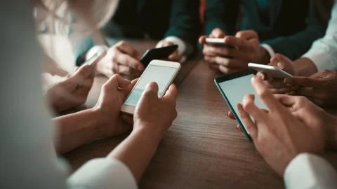 Team of app developers testing the bugs of the new app while testing usability Stock Photos