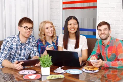 Team of app developers working together Stock Photos