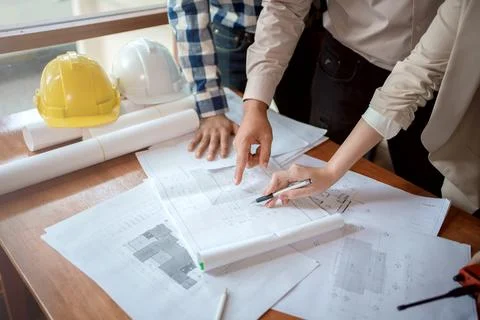 Team of architect and engineer working and discussing about new startup. Stock Photos