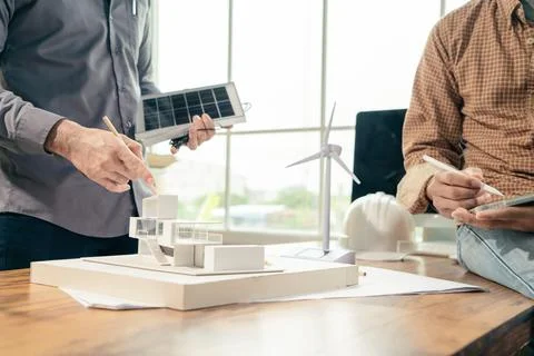 Team Architect brainstorm working design architecture with apply Renewable en Stock Photos